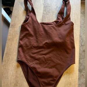 Only worn once bodysuit from Target. Size too big for me . Runs large